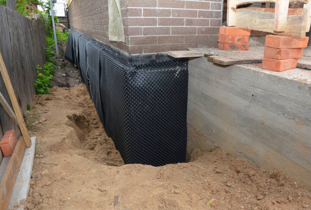 SJ Waterproofing Pros technician performing targeted Basement Waterproofing assessment in Mahwah, NJ